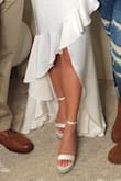Wore this for my engagement party. I didn't want to hem my dress so this dress gave me the height I needed! Comfortable enough for how high it is. I wore it for about 6 hours before taking them off. Wish the strap wasn't so tight though. - Kristina L.