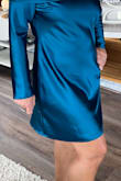 I love the dress! I am 5'1 and a little over my regular weight right now. That's why  I chose one size bigger than my actual size. It's short but the perfect length for me. A beautiful color and made very well. I highly recommend it. - Nilma M.