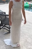 This dress is completely glam and fits so well! I love how light it is; so easy to move around while still looking absolutely gorgeous. And look at that back !!! - Ashlyn M.