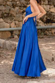 Attending my brother's wedding, I chose this dress and it was an absolute hit! The royal blue color, paired with the backless design, exuded elegance, earning me numerous compliments throughout the celebration. The impeccable fit and comfortable style made me feel confident and beautiful. - Maya S.
