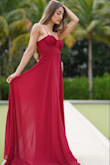 I bought this beautiful, red ball gown not for anything specific, but just to have it for that occasion where you need something classy and elegant like this to wear! I think I will find an opportunity to wear it this holiday season - it is absolutely stunning. I love the fabric, how the top fits, and how it flows majestically with its length. The color also pops incredibly. I can also see myself wearing this for photo shoots, music videos, and live performances as well. Stunning! - Michelle L.