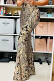 I bought this dress for a Christmas charity gala, and I'm so glad I did. With some nice wedge heels, I didn't even have to get it altered. The material is stretchy, so it fits like a glove. The gold sequins really make this dress so elegant and beautiful. - Hoda B.