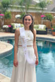 Very impressed by the quality; it does wrinkle a bit, but it irons fine. It is a bit stretchy on the waist and not tight on the hips, so I would size down if you are in between sizes like me. Perfect for style for a resort look! - Paula B.