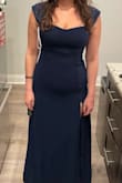 I would say if you have a muffin top, this dress is probably not for you. I did end up returning it because of how it fits. It might be good to size up but I'm not sure how much of a difference that would make. Cute otherwise! - Alejandra G.