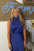 This dress is the perfect blue. Everyone complimented it! It fits true to size, but if you are on the shorter side like me, I would definitely try to get it altered. I wore about 2-3 inch heels and it was still too long but short enough to not drag too much. Also, if you are an excessive sweater, I would probably try to find a different material dress because I had really bad sweat stains:(. Overall I thought this was a very comfortable and beautiful dress! - Abbi C.