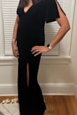 I wasn't blessed with curves or boobs. I have a pretty straight body. I have gained a lot of weight and needed a dress to cover up the insecurities. I loved the sleeves!! Received many compliments. Dress fit well, although very low cut. I had a strapless bra on, and if I bent over even a tiny bit, all was shown. If you're lucky and have boobs, then the dress will help show them off and won't be a problem. I'm usually conscious of my midsection, but I wasn't in this dress. It was long enough for me. I wore kitten heels, and the dress just hit the floor. For tall ladies, if you wear over 2 inch heels, your shoes and ankles will show. The dress draped and moved well. The material was better than I thought. All in all, I'm happy I purchased. - Jennifer A.