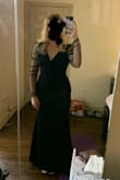 I was impressed by this dress! The material is very smoothing and flattering. Plus, it's stretchy enough that I could easily walk and dance. It was just long enough for me to wear with heels (5'6), so taller ladies may need to size up. The sleeves are stunning and very comfortable! I'm very happy with this dress :) - Claire S.