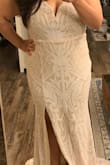 This dress is gorgeous. I am wearing this for my wedding. It has sequins that are so pretty. The sequins do come off which is a bit annoying but for the price, this is still such a beautiful dress. - Carol C.
