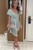 This dress is so fun and pretty! I would say it fits a bit small and is a bit short! When you sit down you definitely have to watch it! Paired with these cutie little shoes I also snagged from LuLus it's a perfect little Christmas outfit. - Alicia M.