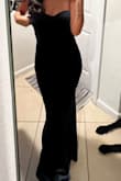I took a risk on this dress and I am so happy with it. It fit me like a dream and while form fitting it is still super comfortable and I was able to walk up and down stairs and dance with no problem. I didn't feel the need to pull it up very much either. The cut is very flattering for me and I received many compliments. I wore this to a black tie wedding with silver accessories and absolutely loved it. - Melanie U.