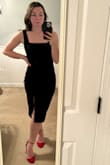 Got this dress for a friend's cocktail wedding. It's snug, but the material is stretchy, so I could still dance the night away. It hugs in all the right places and covers up top just enough, so it's still a classy dress! Paired it with some gold hoops and cute red heels from Lulus!! Only downside is the slit. The slit shifts when walking; at one point, the slit was right in the middle of my legs. Not the worst thing because it's not a high slit! - Morgan E.