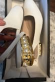 The shoes is really cute and nice but it came with three beads off. Looks like it was packaged with the beads off in the box.
I will keep the shoes anyway because I like them. Now I will need to find a way to put back the beads on. - Cherry S.