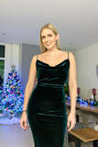 This dress looks so good on! It is form-fitting but very flattering. Love the emerald green color but it is darker than shown on the website. Perfect dress for holiday events and nights out! - Ashleigh W.