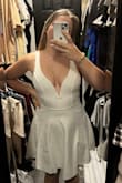 I was on the hunt for a dress to wear during my wedding reception that had details similar to my actual wedding dress. The defined version of this dress is almost exactly the same as my wedding dress! It's perfect. I was surprised with the material; it is a little bit thicker than what I had anticipated. However, it's really comfortable, and I can't wait to wear this dress! - Tristen T.