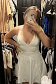 The dress is really comfortable although I'm not a huge fan of the one strap that goes around your arm (see photo). The underlining is a little short for my booty personally, but it's cute and snug! I love the really low back as well. I'll be wearing this for either my bachelorette or rehearsal dinner, and I will be bringing it with me on my honeymoon for good measure - Tristen T.