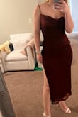 I really like this dress, very sexy/flattering. Only complaint is that there's no support for the girls and very few bras to wear with it without showing. If you're bigger chested, then it could be an issue. Also, the slit is fairly high if you have shorter legs. Otherwise, I like it a lot, and I've got so many compliments on it. - Alayna M.
