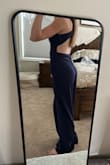Super cute jumpsuit. It fits true to size. I wore it with heels and it was the perfect length. Very comfortable and flexible material. Great for dancing! - Kalean B.