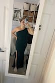 I absolutely LOVE this dress! As a smaller 5ft woman with a larger top, I always struggle to find dresses that fit. I am a 36D bust so the top fits perfectly, but I had to get a few inches cut off the bottom. The only reason I gave it 4 stars is because it doesn't come in petite, and it cost a lot to get it hemmed! - Heather L.