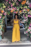 This easy breezy outfit is perfect for summer or vacation to a tropical place. While the pants are a little see-through and the slit runs very very high it is a cute outfit. The top is a little strange and was uneven on me but still made it work. - Iris A.