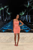 The perfect mix of vibrant and sexy. The material is very very thick but super comfortable. I wore this for a night out and it was a show-stopper. - Iris A.