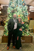 I purchased this dress to wear to a winter gala. The color is a rich, deep green and the quality of the dress is incredible. I'm pear-shaped, much smaller up top with wide hips. The large was a little loose on top but fit well on my hips with plenty of stretch for moving and dancing. The slit on the leg was a little high with these hips. When I sat down little was left to the imagination. But a quick trip to a seamstress helped lower the slit and it was much more appropriate. I received so many compliments and I cant wait to wear this dress again! - Ashley S.