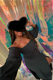 I was terrified to shop here as none of the dresses looked like they had enough top space to fit my 34JJ bust, but this in Large works very well with a strapless bra. The material is stretchy and the mid section of the dress doesn't accentuate my large gut which I was scared of with such a "fitted" style. The dress was a tad lighter than it appeared in the model pic and I honestly like it better in person. The material doesn't appear to be super thin & cheap which is a huge fear in online shopping. Length is GREAT only 2-3 inches too long which is fixed with a good pair of heels. I'm not an online shopper and I didn't expect to like this, but I really do! - Aretha G.