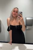 As someone who has never worn anything strapless before, I was initially worried about the dress holding up, but there are elastic/rubbery bands lining the collar of the dress that really helps stick to your skin so nothing falls off or out. Jumped around to make sure really nothing would budge. I got a lot of compliments on this dress at an opera gala I attended, and it's a great way to make a statement, especially with pops of color elsewhere like with your shoes or accessories. Overall, loved it! - Jordan M.