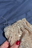I liked it, but the sleeves started falling apart on the first night wearing it. I only wore it for a few hours and now there are a bunch of strings at the end. For $100, I would have expected better quality - Brittaney R.
