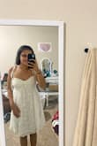 Fits great! Easy to put on! Cute top! Stretchy! Just above knee length - Chloe H.