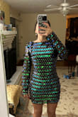 I loved this dress and it was tight-fitting and flattering BUT it was just a smidge too small for my taste. I like to dance so I couldn't see myself letting loose with this short of a dress, - Claudia K.