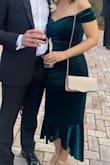 I am absolutely obsessed with this dress! It was the perfect dress for the wedding I attended and will be so cute for the Christmas season! It's form-fitting but has a stretch to it, so it's comfortable. I got so many compliments! Love love love! - Ashley J.