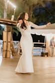 I wore this to dance hula in for my wedding & stayed in it for the rest of the night. SO comfortable and easy to move in. I got it altered beforehand to remove the train so it was easier to dance in. Undergarments do need to be sheer so it doesn't show through the fabric. Overall, highly recommend it! I got so many compliments on it that night. - Lorelei P.