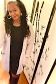 I'm in love with this sweater. It is very warm, soft, and comfortable as well as stylish. It's perfect for layering. Definitely buy it. It runs very large. For an oversized fit stick to your regular size for a more fitted look go down 1-2 sizes. I'm 5'2 174 curvy and got an XS. - Maia Q.