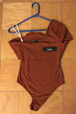 I thought this was a really cute item, so I bought it. I usually don't buy bodysuits from Lulus, but nearly every dress I own is Lulus because their items tend to fit me perfectly. However, the bottom of the body suit stuck on my crotch and it was altogether uncomfortable. - Jacquelyn S.