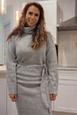 I love the dress. The material is soft and warm. It fits true to size. I bought it to wear to the office, but I can certainly dress it up more for a nice dinner out. - Jodi N.