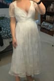 I love this dress, it is a perfect bridal look. A little more busty than I expected, but still beautiful. - Kalli K.