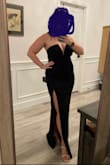 This dress is cute, I like it. It's form-fitting so it does show a little tummy, but was fine with some Spanx. The top portion was a little loose/big and actually folded under itself at the bottom of the V portion. I probably could've gotten away with a medium instead. - Olivia H.