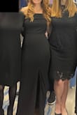 Thick and stretchy material. I am usually a size 2 pants, and the small fit great with a little extra room. It does run long. It grazed the ground even with my heels on, so anyone shorter than 5'6 would probably need it hemmed. It was comfortable to wear all day. Definitely recommend. - Heather B.