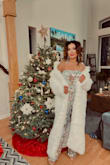 It is a stunning jumpsuit without straps. At my company's Christmas party, I received a ton of compliments. It's very comfortable easy to walk and move or sit down. It's a true small size that perfectly fit me! - Sophanna J.