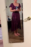 It's really flattering. A bit lower cut than I expected (but most wrap dresses are). I actually ordered a large to see if it'd be a better fit, but I was concerned about the return window. I chatted with customer service, who was AWESOME, and they extended my return window for the first dress and expedited the shipping for the second. I ended up staying with the medium bc the large had too much fabric at the front. I'll just use a bit of garment tape, no problem. The fabric is gorgeous and shimmery. It makes me feel feminine, but it's also comfortable and won't need constant readjustment or careful movement like some dresses require. - Jeannie R.