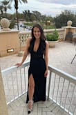 I absolutely LOVE this dress! The material is very nice, as it doesn't really wrinkle. The slit is the perfect touch, and the top can either be worn crossed or like a halter. One of my favorite dresses ever ever ever :) - Whitney S.