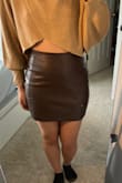 Really cute skirt! Fits my slightly curvy body perfectly. I am usually between sizes 6 and 8 and sizes 28-30 in jeans, with wider hips and a smaller waist. The M in these skirts fit me very well (though I did have to slide the skirt up a bit to zip it up all the way). - Mona W.