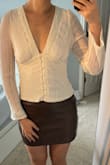 I'm a 36B/C - 38B in bra, and these tops look very flattering. The sleeves feel and look cheap. Otherwise, it's a really cute top! I own a similar style top, but the chest area is huge on that one; I appreciate that these are more flattering for my somewhat flatter chest - Mona W.