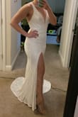 Dress is nice but runs small. I do have a larger butt, so it was tight. Might take it to a honeymoon but not a wedding dress for my style. Would be nice for a beach or lake wedding. - Kayla S.