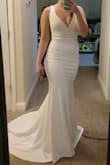 I bought this dress and a few others. It is my favorite one out of them all. It is small in the chest area, and I am a small chested woman. Lace at the top is not very cute, but I think it's an easy alteration to get rid of it. - Kayla S.