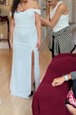 The dress came just as the pictures appeared. I'm usually in between a small and a medium but this time I couldn't even zip up the dress that I got in small. The design was a little too simple for what I was looking for but if you like it, I'd recommend it. - Lara K.