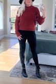 I have this sweater in gray and so bought another color this year. Super flattering, and cropped but I always wear high-waisted leggings or jeans with it, so it works. Super soft and comfy. I always get compliments! Would buy in every color if they had!
**I went from a 34DDD to a 34C (pictured here) and this sweater was flattering with both sizes! - Haley S.