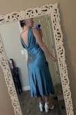 I love this dress and would buy it in every color if I could. Used some double-sided tape to hold it in place on my shoulders and around my chest, and it was great! The downside is that it is satin and easily shows liquids/sweat and stains. But this is a very thick and high-quality fabric. Would have loved this in white as well if they had it! - Jessica P.