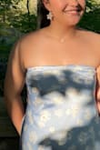This dress was beautiful, easy to dance in, and very comfortable. Lulu's Riya Gold and White Flower Earrings match this dress perfectly so they're a must-have when buying this dress. - Christa H.