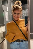 This sweater fits better than I expected. It pulls off the oversized sweater look adding a hint of sexiness with the bare shoulders. I also received several compliments on the rich color. - Sable G.